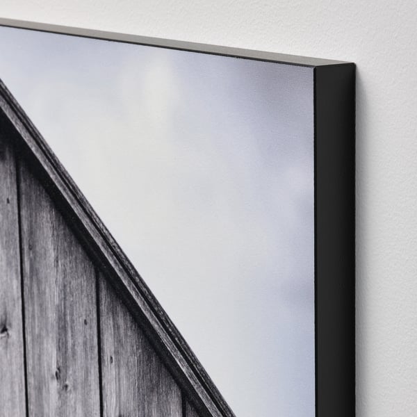 Svartvitt inramat fototryck, synliga material av hög kvalitet.