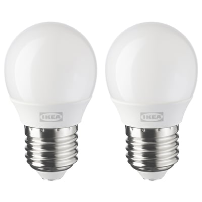 Två identiska ikea led-lampor, vita, sfäriska form, som står upprätt sida vid sida.
