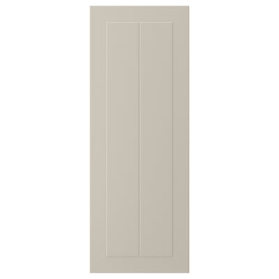 En beige STENSUND skåpdörr med en slät, inramad design.