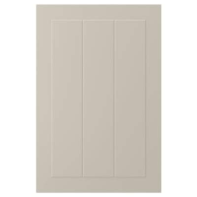 En beige STENSUND skåpdörr med en slät, inramad design. Den är tillverkad av träfiberskiva och har en lackerad yta som står emot fukt och fläckar.