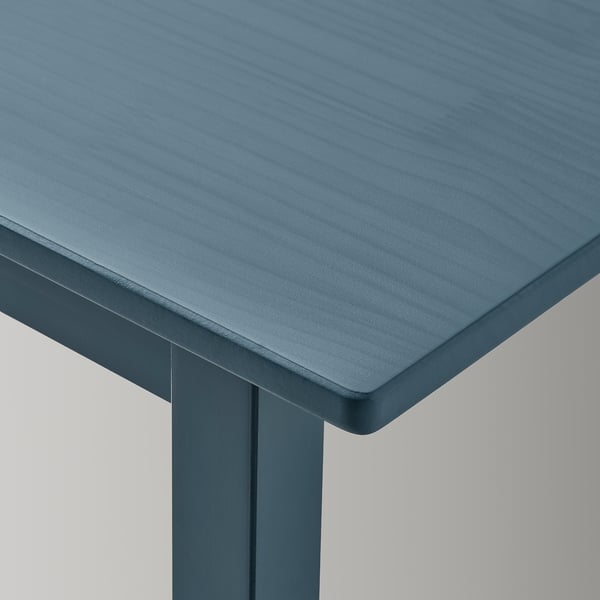 Blått träbord, slank design, släta kanter, robust konstruktion, perfekt för lekplatser för barn.