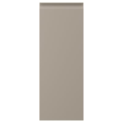 En beige UPPLÖV kökslucka med en elegant, modern design med ett sömlöst integrerat handtag.