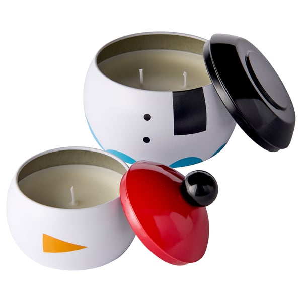 Färgglada snögubbeljus, växtvax, lock av, vit bakgrund.