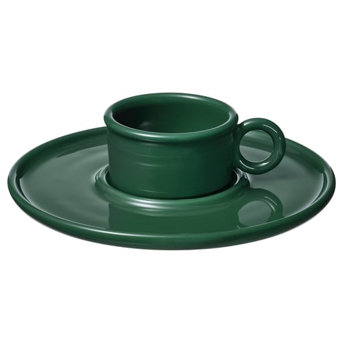 Mörkgrön kaffekopp i keramik med matchande fat och handtag. Enkel, elegant design. Perfekt för te eller kaffe.