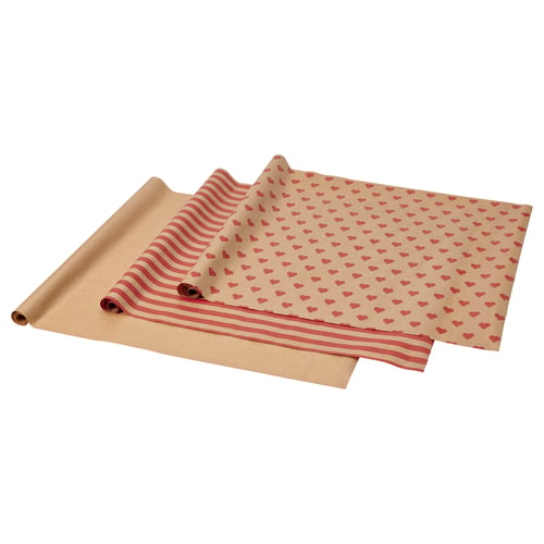 Tre rullar ljusbrunt omslagspapper. Design: röda hjärtan och vågiga ränder. Återvunnet material.