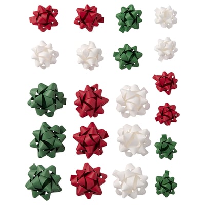 Färgglada pappersrosetter i rött, grönt och vitt, arrangerade i ett 5x5 rutnät, runda med intrikata veck.
