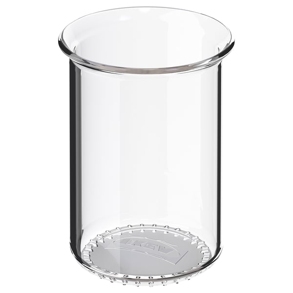 VOXNAN glaskopp, klar, rund, enkel design, sitter på en plan yta.
