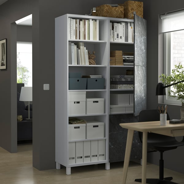 BESTÅ Storage combination with doors, white Bergsviken/black marble effect, 120x42x202 cm