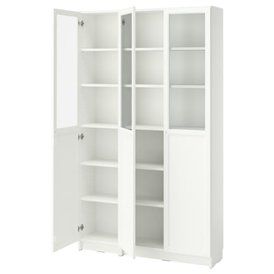A white BILLY bookcase with glass doors, featuring multiple adjustable shelves for storage.