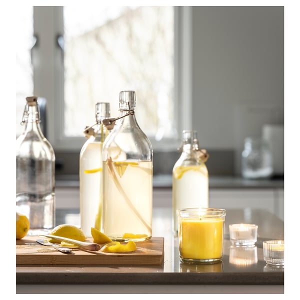 BLODHÄGG Scented candle in glass, lemon & lemongrass/yellow, 40 hr
