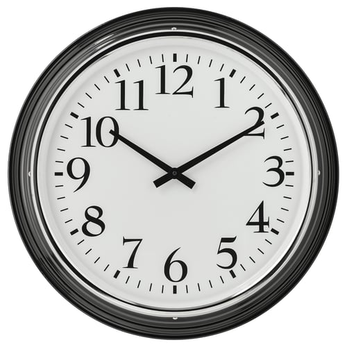 A BRAVUR clock. It is black and white, round, with black numbers and hands on a white face. Silent quartz mechanism.