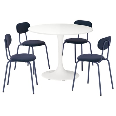 A modern white round table with four blue upholstered chairs, each featuring a steel frame.