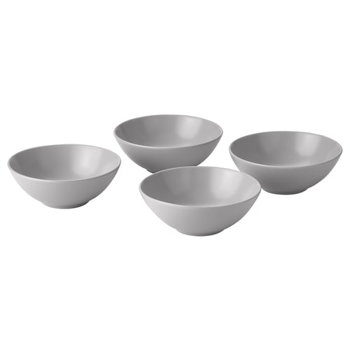 Four grey stoneware bowls in simple, modern design with smooth finish.