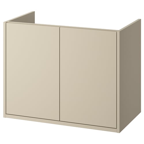 A beige HAVBÄCK bathroom cabinet. Its rectangular, featuring two doors with a simple, clean design. The cabinet is wall-mountable for a spacious look.