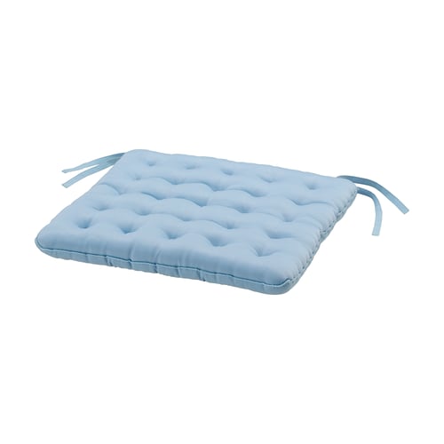 Light blue rectangular seat cushion with tufted design & ties for securing.
