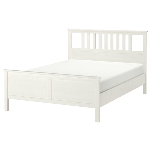 White HEMNES wood bed with slatted headboard, sturdy frame, adjustable sides.