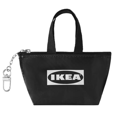 Small black keychain bag by IKEA, oval logo. Miniature zip, dual carry straps, key ring hook.