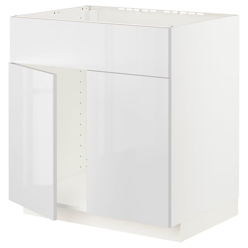 White kitchen cabinet unit, modern design, glossy finish, square shape, with no door.
