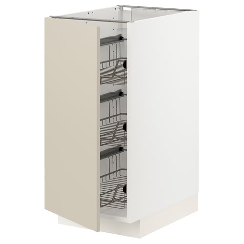 Ikea METOD white pull-out shelves, beige door, metal baskets.