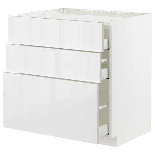 White METOD kitchen unit with glossy drawers and smooth edges.