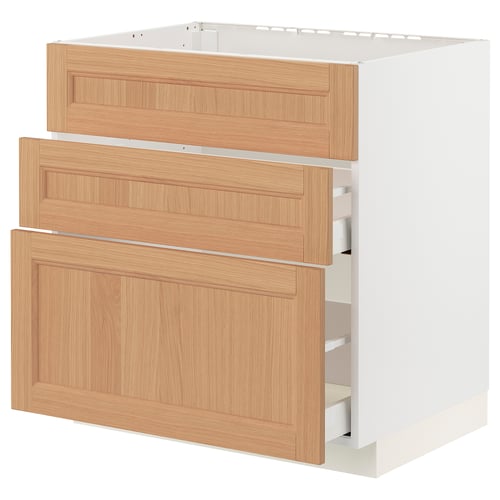 METOD kitchen cabinet with oak drawers and white base.