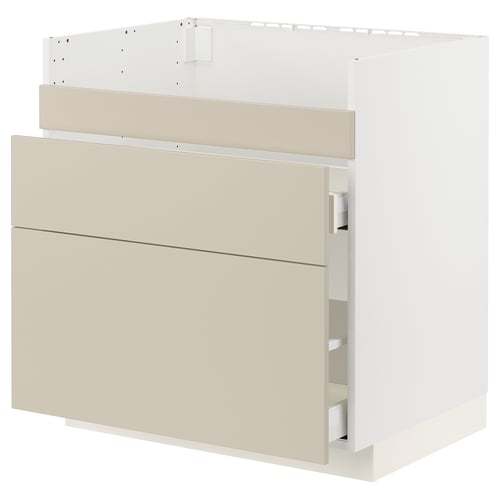 Modern light beige kitchen cabinet with smooth surfaces and soft-closing drawers.