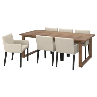 Modern rectangular wooden dining table with six padded chairs, light beige upholstery, sleek black metal legs.