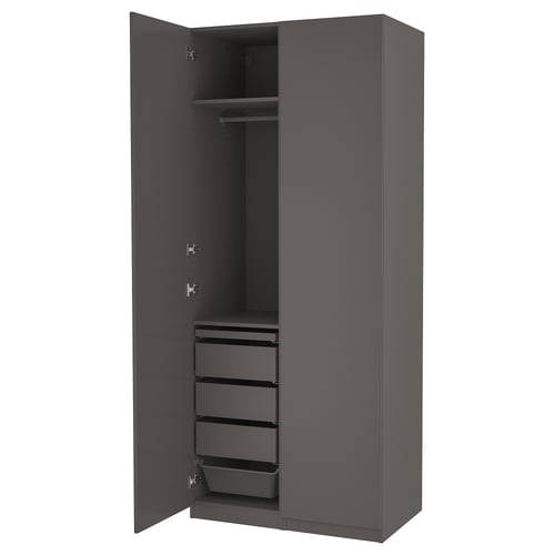 Dark grey PAX wardrobe, open, with shelves and drawers.