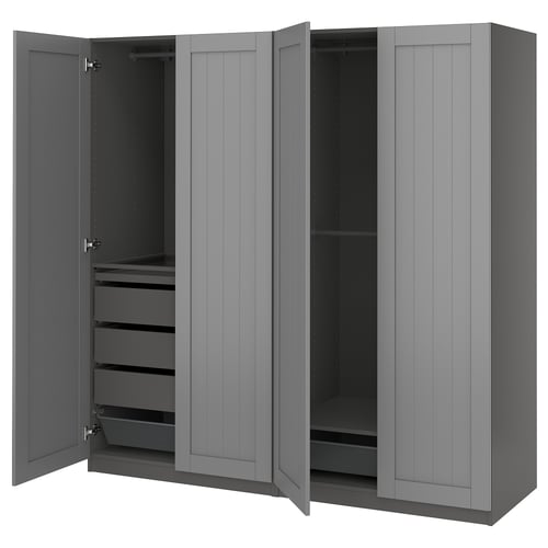 A grey PAX wardrobe with open doors, revealing drawers and shelves inside.