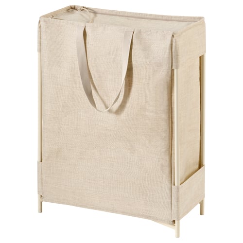 A beige PURRPINGLA laundry basket with a plastic-coated, two-compartment bag. It has sturdy handles and a metal frame for stability.