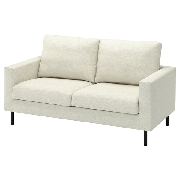 This image shows a light beige SALTSJÖBADEN sofa with wooden legs and cushioned back and seat.