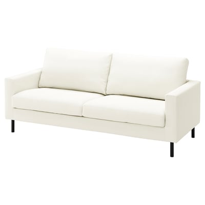 Modern white sofa: SALTSJÖBADEN. Clean lines, cushy pillows, and dark legs.