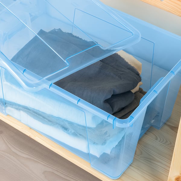 Blue SAMLA box with blankets and towels.