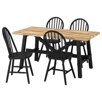 SKOGSTA dining set: black chairs, light wooden table, minimalist.