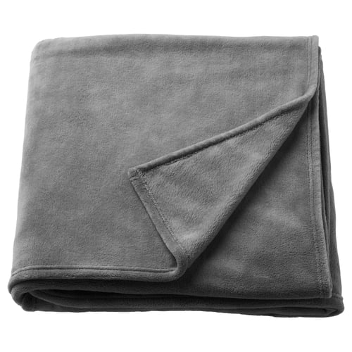 Folded grey recycled polyester fleece blanket, soft & lightweight, perfect for cosy warmth.