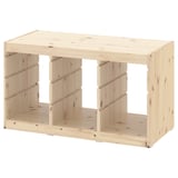 The TROFAST wooden storage unit in light pine, characterised by its rectangular shape and open compartments.