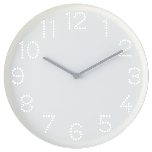 Round white wall clock with numbered holes, two hands, simple design.