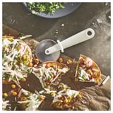 UPPFYLLD Pizza cutter, off-white