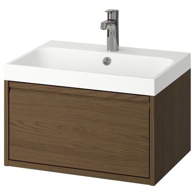 Sodoben kopalniški umivalnik z imenom ÄNGSJÖN iz rjavega hrasta z belim umivalnikom. Ima en sam predal in eleganten, minimalističen dizajn.