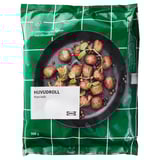 Zelena IKEA vrečka s kuhanimi rastlinskimi kroglicami v ponvi, označena z HUVUDROLL rastlinskimi kroglicami 500g.