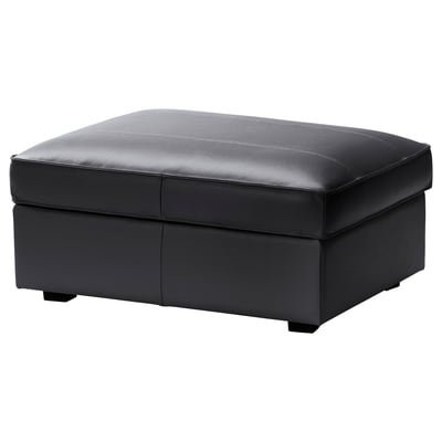 KIVIK sivá kožená podnožka s úložným priestorom, elegantný obdĺžnikový dizajn.