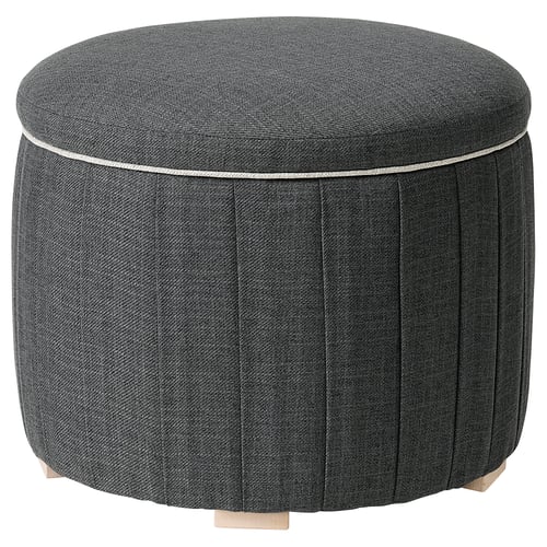 Round grey fabric stool with wooden legs, pleated sides, and thin piping around the top.