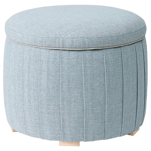 Light blue cushioned round storage ottoman with wooden legs, pleated sides and piping.