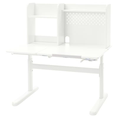 A white BERGLÄRKA adjustable study desk for children. It a tilting work surface, a pegboard, and adjustable legs.