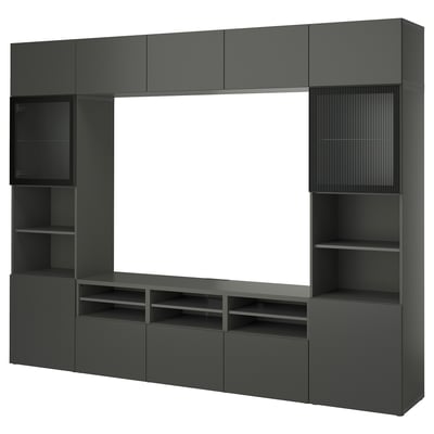 Dark grey modern tv unit with multiple shelves and cabinets for storage.