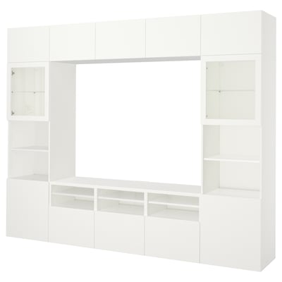A white BESTÅ tv storage unit with open and closed shelves, designed for organising electronics and display items.