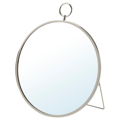 Round nickel mirror with wall hook and stand. Elegant, functional design.