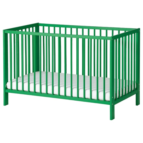Green GULLIVER baby crib with mattress, rectangular, wooden slats.