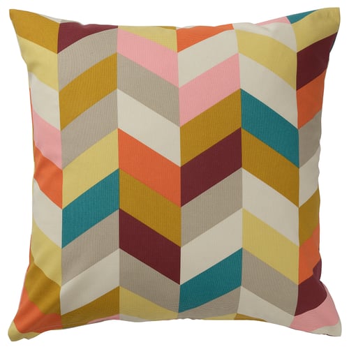 Multicoloured zigzag pattern pillow, square shape, vibrant colours, textured fabric, chevron design.