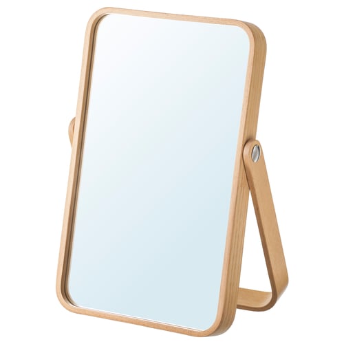 Ikornes mirror rectangular ash veneer frame, versatile for table or wall use. Soft shapes and warm colour create a cosy feel.